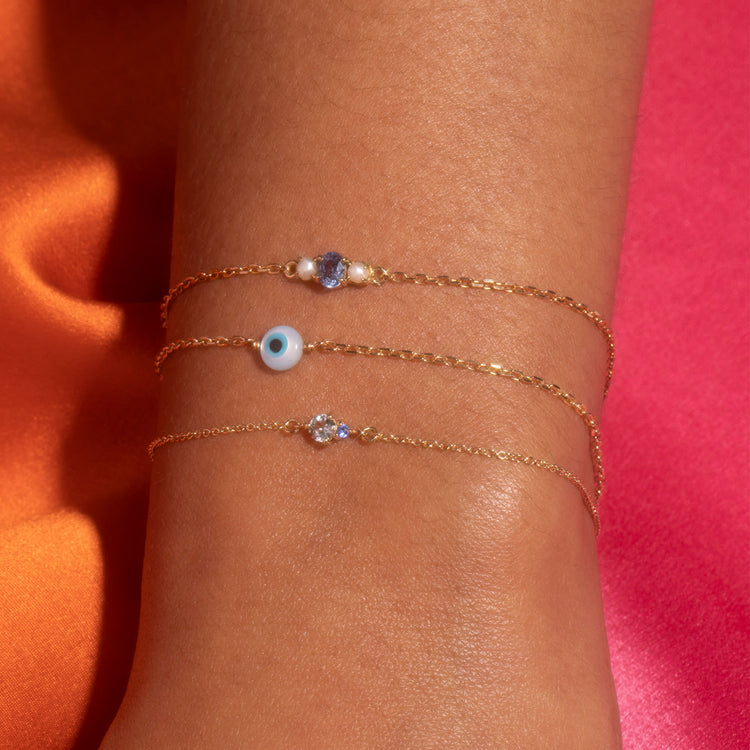 Image of 14K Yellow Gold Tiny Aquamarine and Sapphire Slider Bracelet with Stone and Strand Bracelets