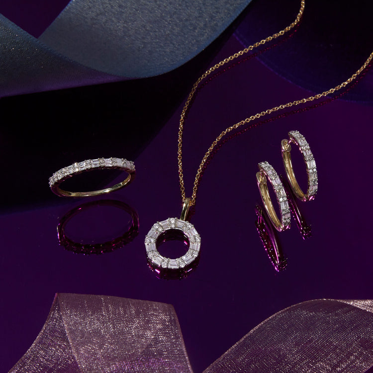 Still life image of Diamond Code Huggies with Stone and Strand solid gold jewelry