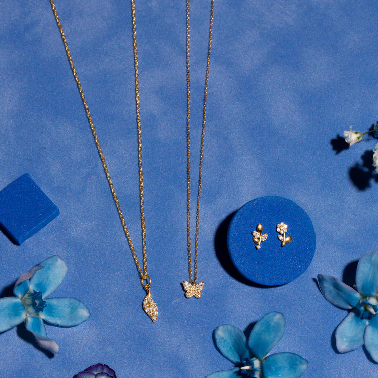 Still life image of Blooming Diamond Flower Studs with Stone and Strand solid gold jewelry
