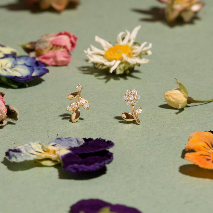 Stone and Strand 14K Yellow Gold Blooming Diamond Flower Studs Editorial Image