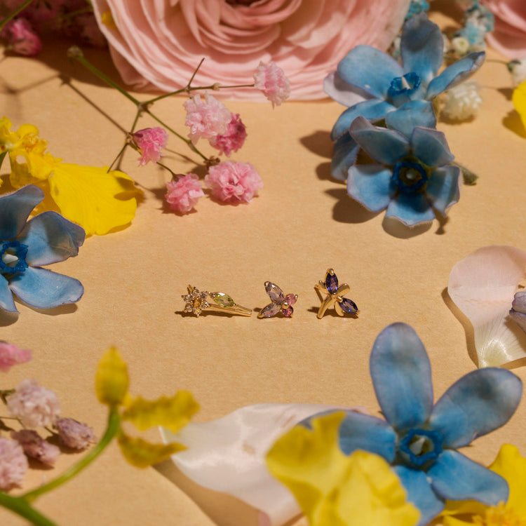 Still life image of Iolite Dragonfly Studs with Stone and Strand solid gold jewelry