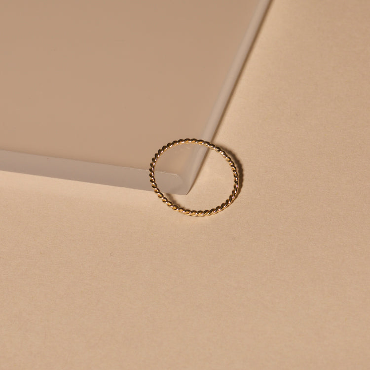 Stone and Strand 10K Yellow Gold Bold Gold Twist Ring Editorial Image