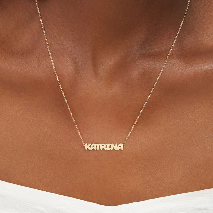 Image of 10K Yellow Gold Bubble Tea Name Necklace on Models Neck