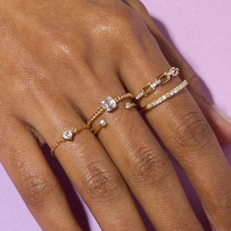 Chain Reaction Topaz Ring