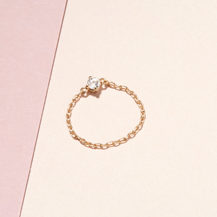 Chain Reaction Topaz Ring