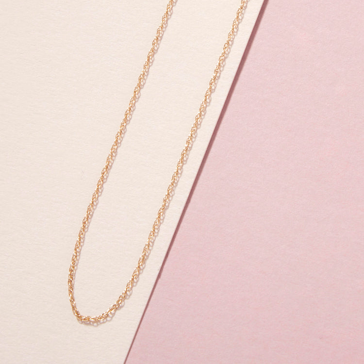 Stone and Strand 10K Yellow Gold Ultra Dainty Twist Chain Necklace Editorial Image
