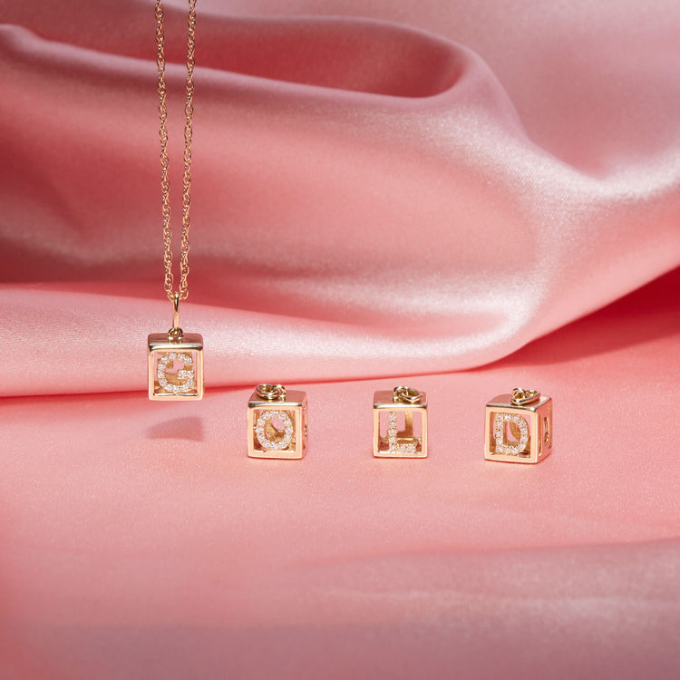 Still life image of Diamond Baby Block Necklace with Stone and Strand solid gold jewelry