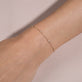 Image of 10K Yellow Gold Teeny Diamond Drizzle Bracelet on Models Arm