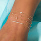 Image of 10K Yellow Gold Teeny Diamond Drizzle Bracelet with Stone and Strand Bracelets