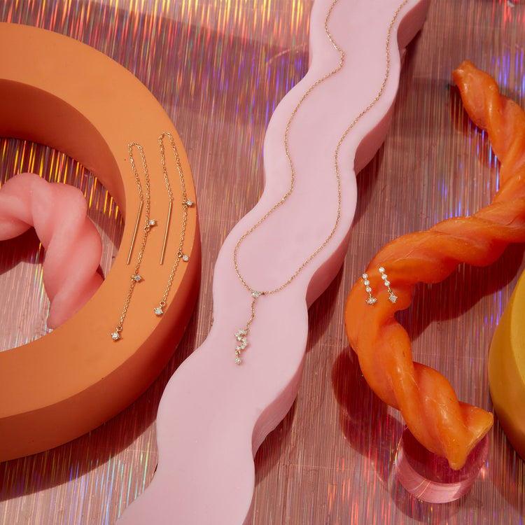 Still life image of Diamond Drizzle Threaders with Stone and Strand solid gold jewelry