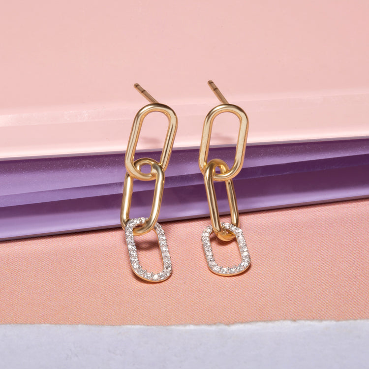 Stone and Strand 10K Yellow Gold Small Diamond Linked Up Earrings Editorial Image