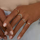 Image of 14K White Gold Diamond Twirl Ring with Stone and Strand Rings