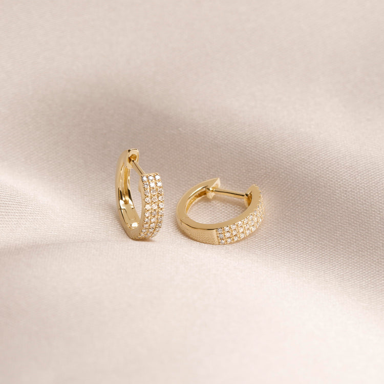 Stone and Strand 10K Yellow Gold Large Diamonds On Diamonds Huggie Earrings Editorial Image