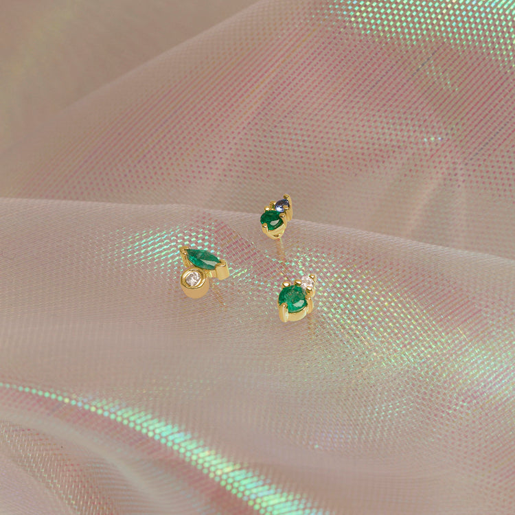 Still life image of Emerald and Sapphire Buddy Stud with Stone and Strand solid gold jewelry