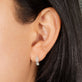 Image of 10K Yellow Gold Fine Diamond Maritime Huggies on Models Ear