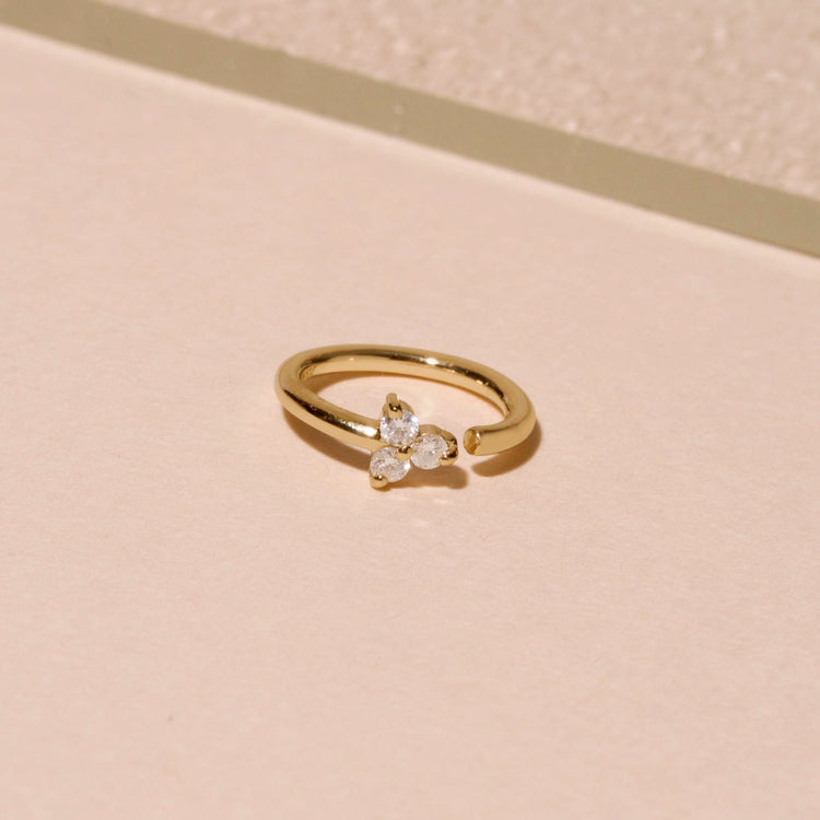 Stone and Strand 14K Yellow Gold Fixed Trio Diamond Hoop Earring Editorial Image