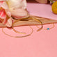 Still life image of Flat Cuff Bracelet with Stone and Strand solid gold jewelry