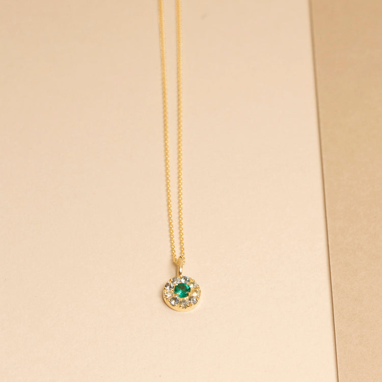 Stone and Strand 10K Yellow Gold Medium Floating Emerald Pendant Necklace Editorial Image