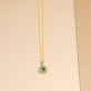 Stone and Strand 10K Yellow Gold Medium Floating Emerald Pendant Necklace Editorial Image