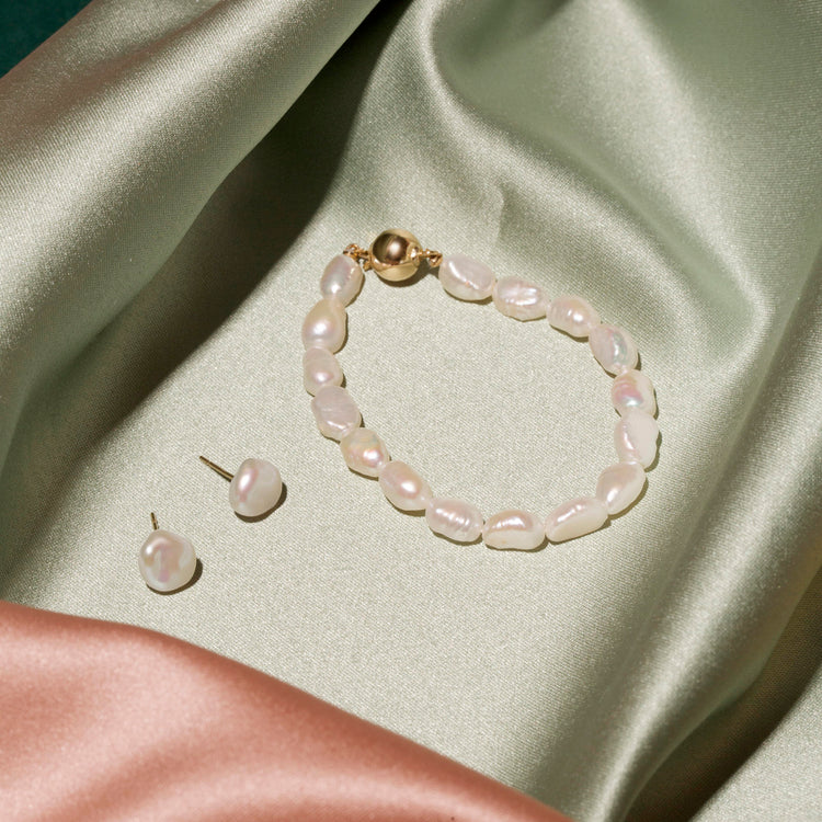 Still life image of Freeform Pearl Studs with Stone and Strand solid gold jewelry