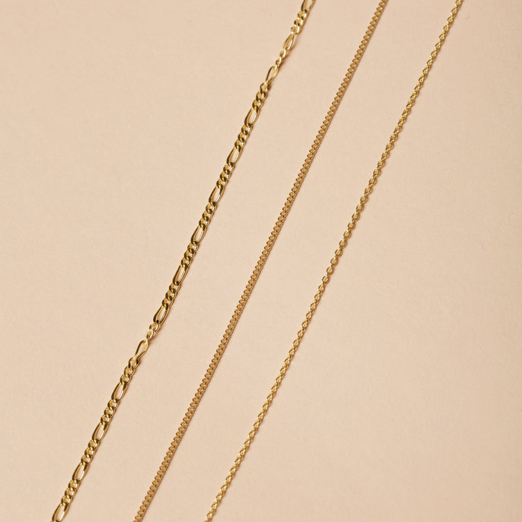 Still life image of Ultra Fine Gold Chain Choker with Stone and Strand solid gold jewelry