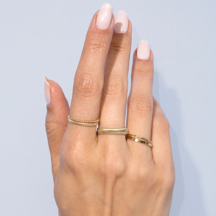 Image of 10K Yellow Gold Bold Pleated Cigar Band with Stone and Strand Rings