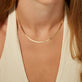 Image of 10K Yellow Gold Golden Glow Herringbone Necklace on Models Neck