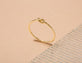 Stone and Strand 10K Yellow Gold Gold Knot Ring Editorial Image