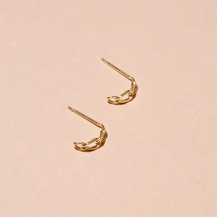 Stone and Strand 10K Yellow Gold Half Chain Huggies Editorial Image