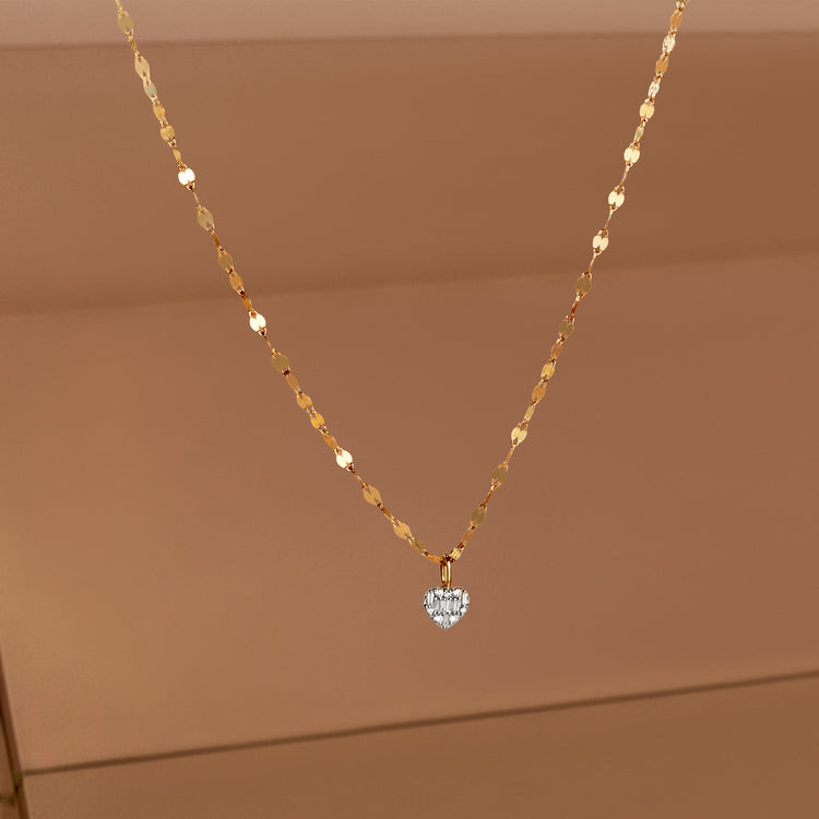 Stone and Strand 10K Yellow Gold Small Heart of the Matter Diamond Choker Necklace Editorial Image