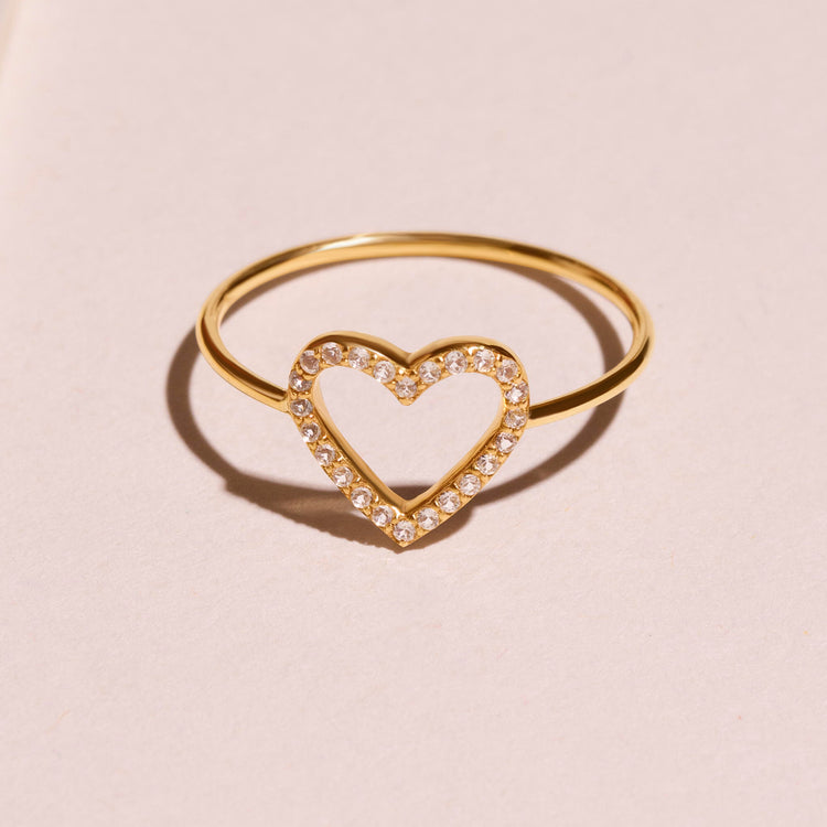 Stone and Strand 14K Yellow Gold Heart Wide Open White Topaz Ring Editorial Image