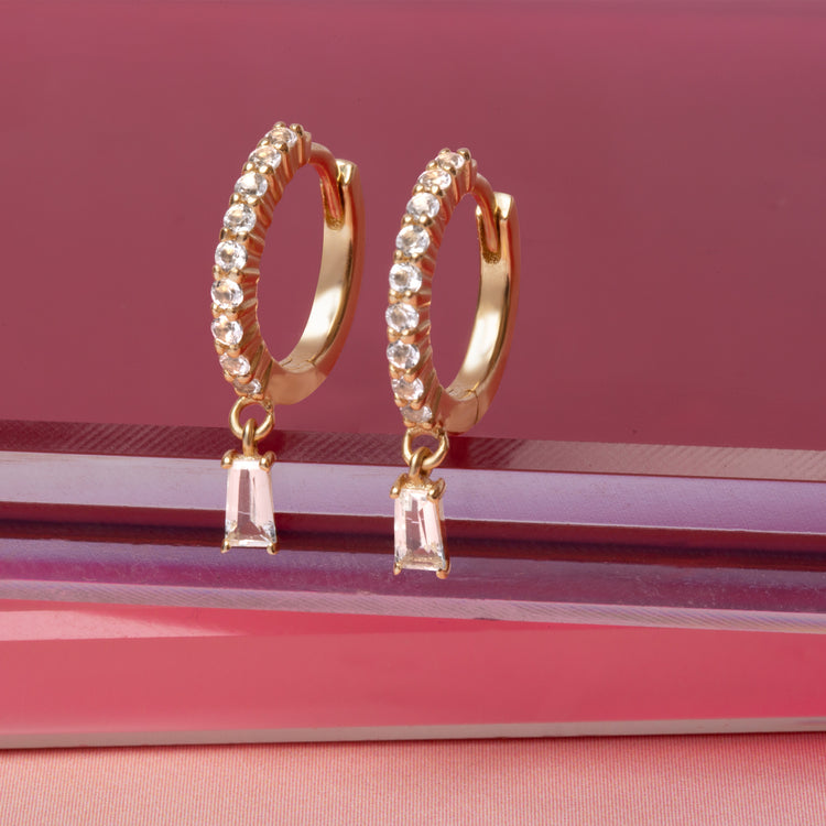 Icicle Topaz Huggies