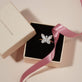 Still life image of Jumbo Butterfly Diamond Ring with Stone and Strand gift box