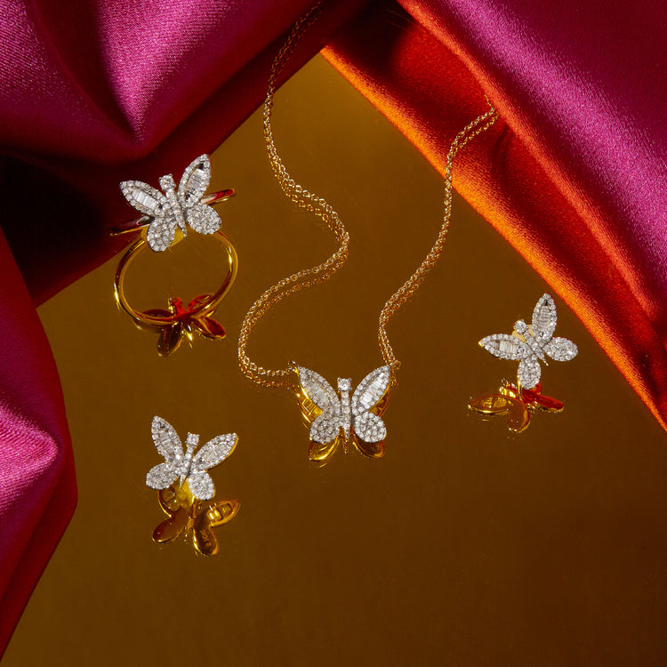Still life image of Jumbo Butterfly Diamond Studs with Stone and Strand solid gold jewelry