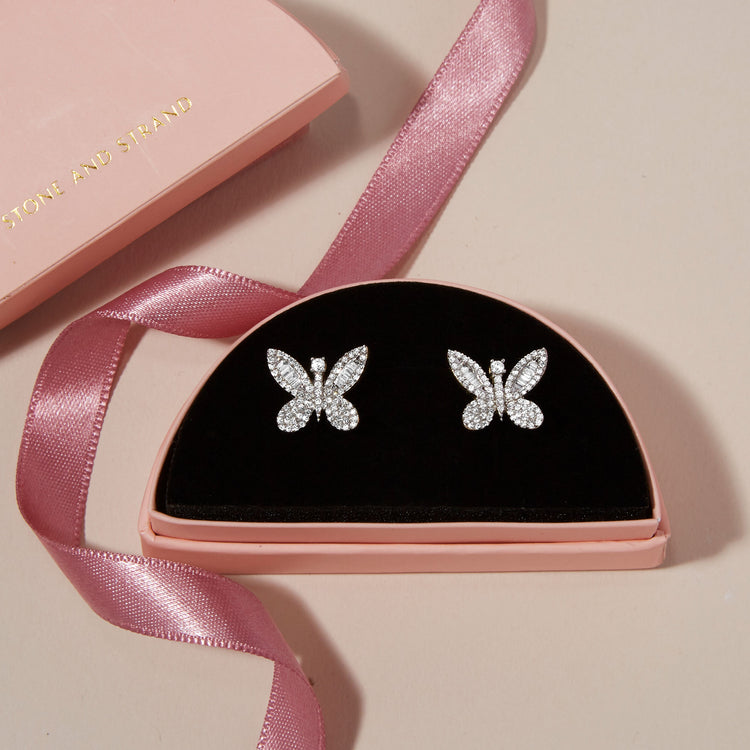 Still life image of Jumbo Butterfly Diamond Studs with Stone and Strand gift box