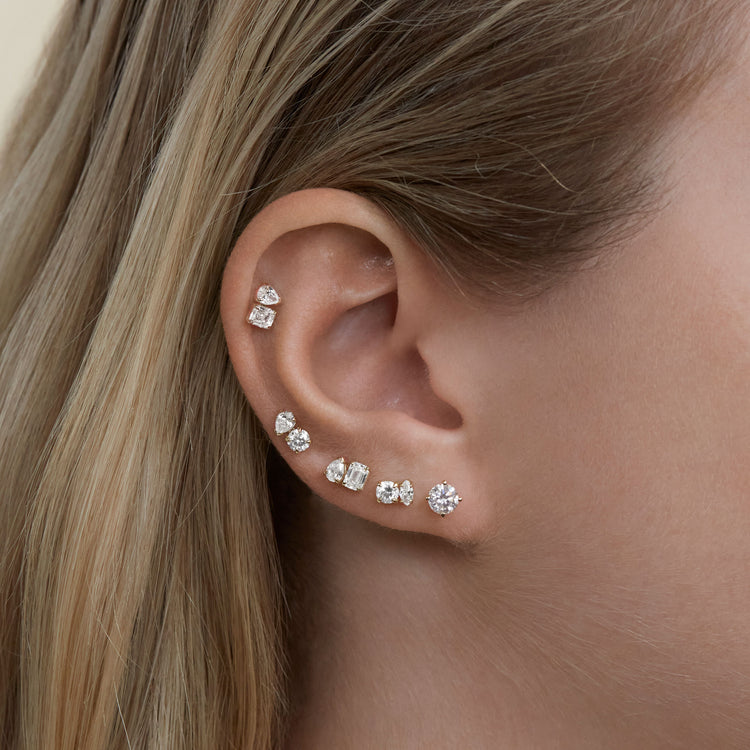 Model wearing Lab-Created Diamond Festival Studs with solid gold Stone and Strand jewelry