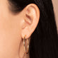 Image of 14K Yellow Gold Large Classic Hoops on Models Ear