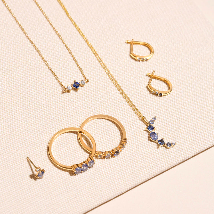 Still life image of Le Bleu Slider Bracelet with Stone and Strand solid gold jewelry