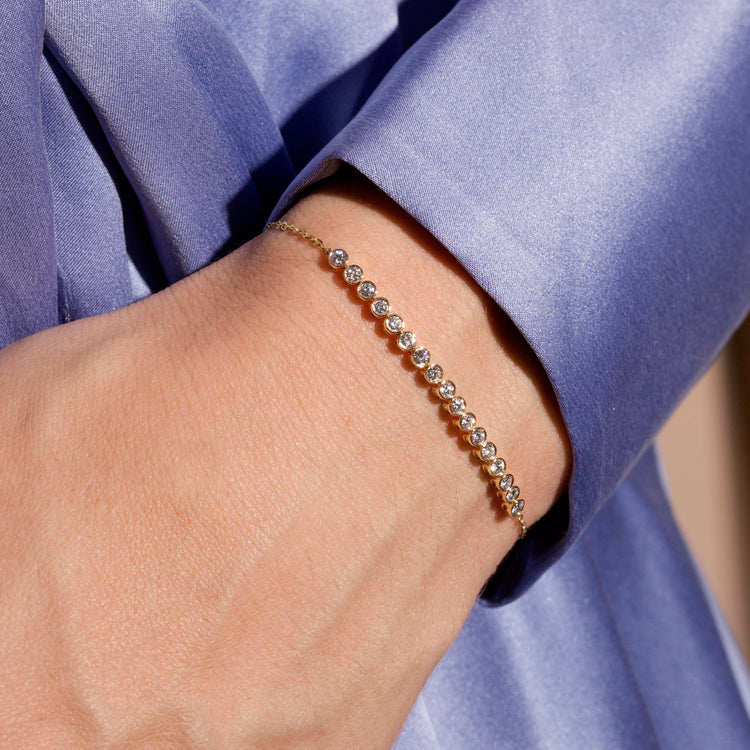 Image of 10K Yellow Gold Let It Slide Diamond Tennis Bracelet on Models Arm