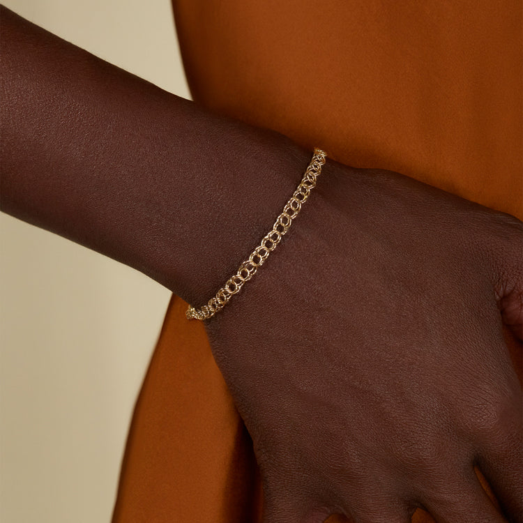 Image of 10K Yellow Gold Link by Link Bracelet on Models Arm