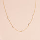 Stone and Strand 10K Yellow Gold Lucky Pearl Necklace Editorial Image