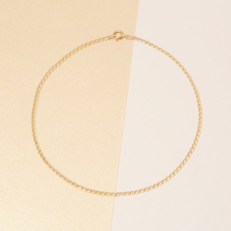 Stone and Strand 10K Yellow Gold Maritime Anklet Editorial Image