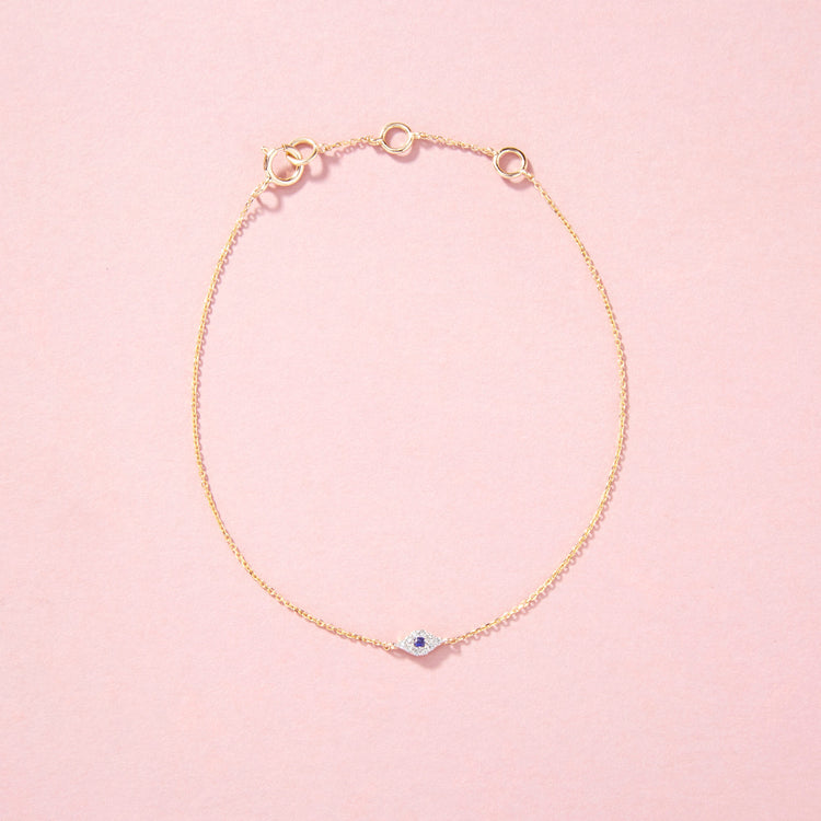 Stone and Strand 14K Yellow Gold Mini Pave Diamond Evil Eye Bracelet Editorial Image