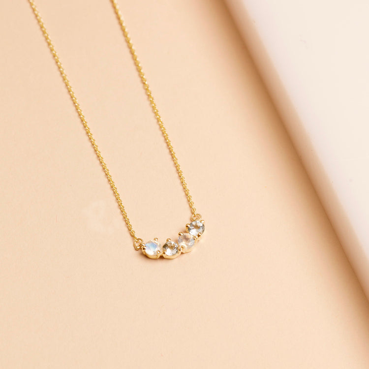 Stone and Strand 10K Yellow Gold Moonstone Aquamarine Mama Necklace Editorial Image