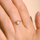 Image of 10K Yellow Gold Moonstone Oval Cabochon Fine Ring on Models Hand