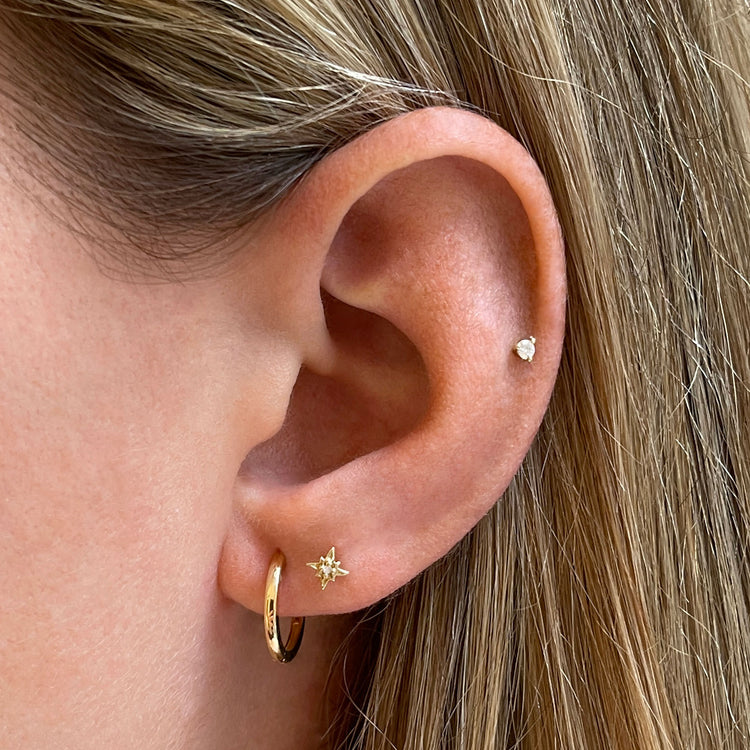 Image of 10K Yellow Gold Tiny Never Take It Off Ear Stack on Models Ear