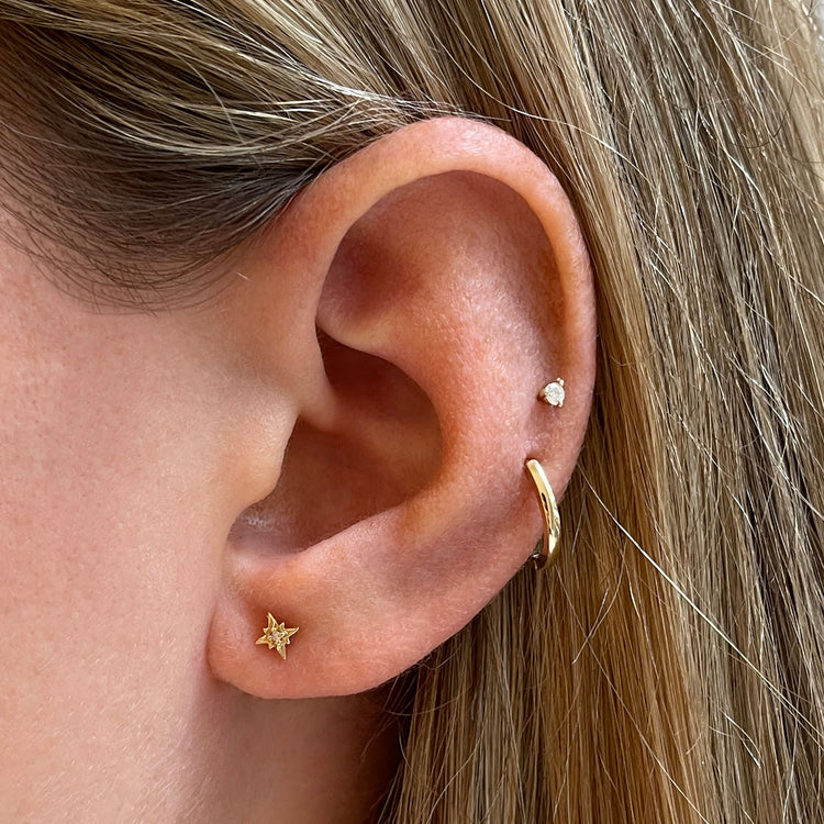 Image of 10K Yellow Gold Tiny Never Take It Off Ear Stack on Models Ear