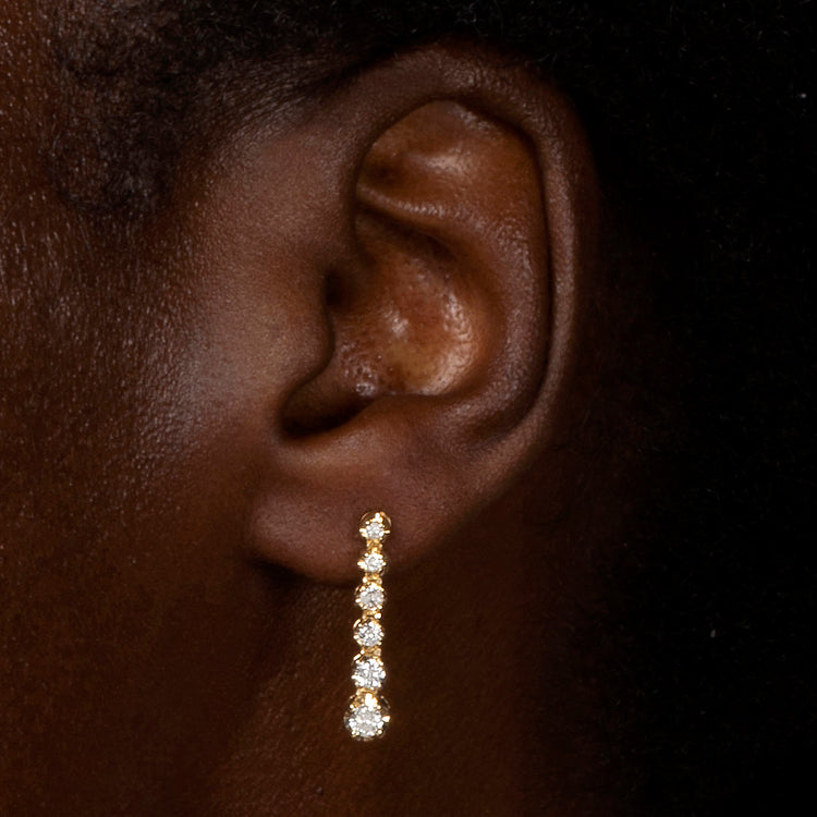 Image of 10K Yellow Gold Noble Diamond Tennis Earrings on Models Ear