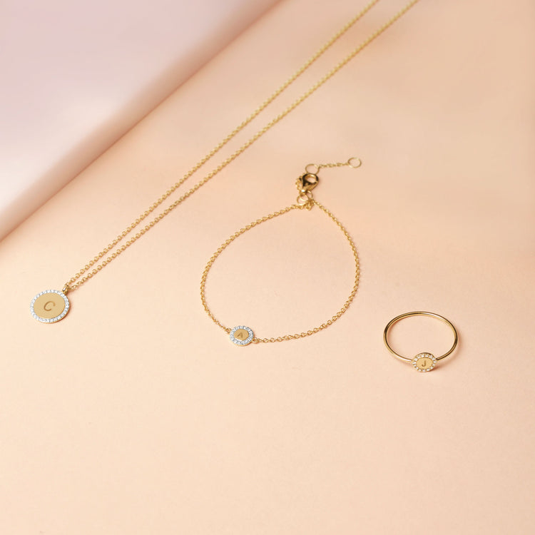 Still life image of Pave Diamond Disc Necklace with Stone and Strand solid gold jewelry
