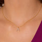 Image of 10K Yellow Gold Pearly Initial Necklace on Models Neck
